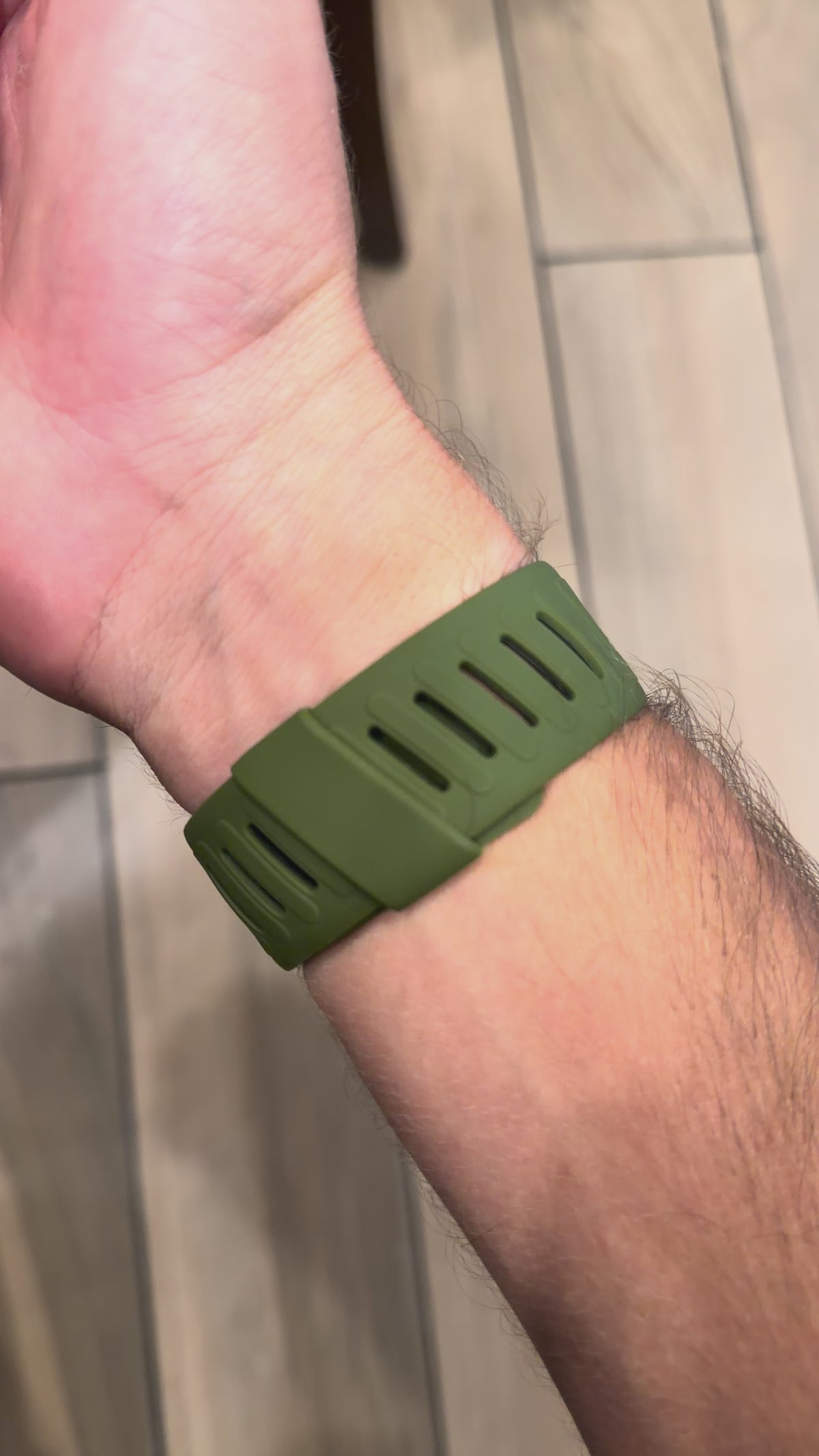 Close-up of the PulseBands orange band on the wrist